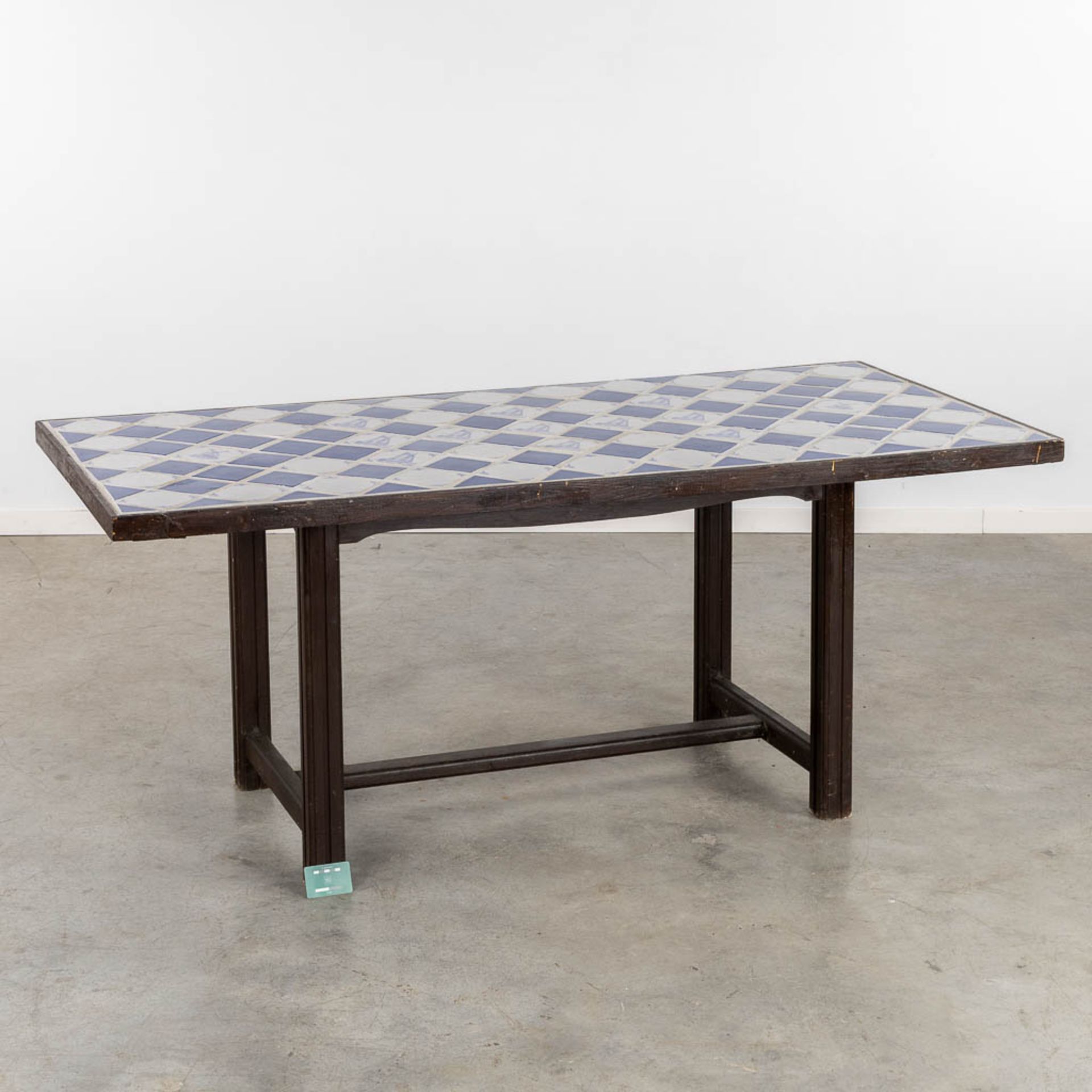 A Spanish table, finished with white and blue tiles. (L:85 x W:184 x H:76 cm) - Image 2 of 11