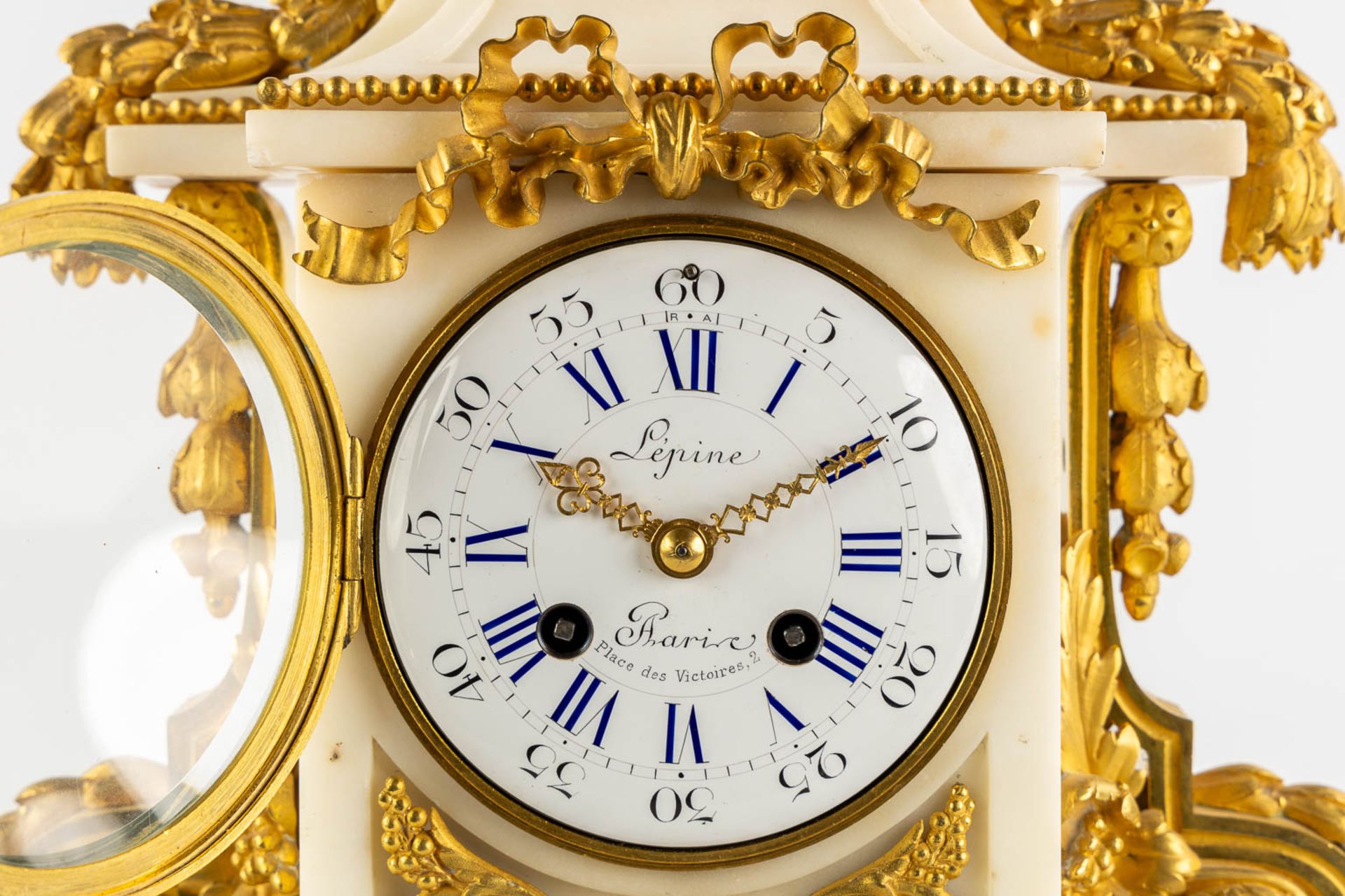 Lépine, a three-piece mantle garniture clock and candelabra. France, 19th C. (L:15 x W:31 x H:42 cm) - Image 10 of 10