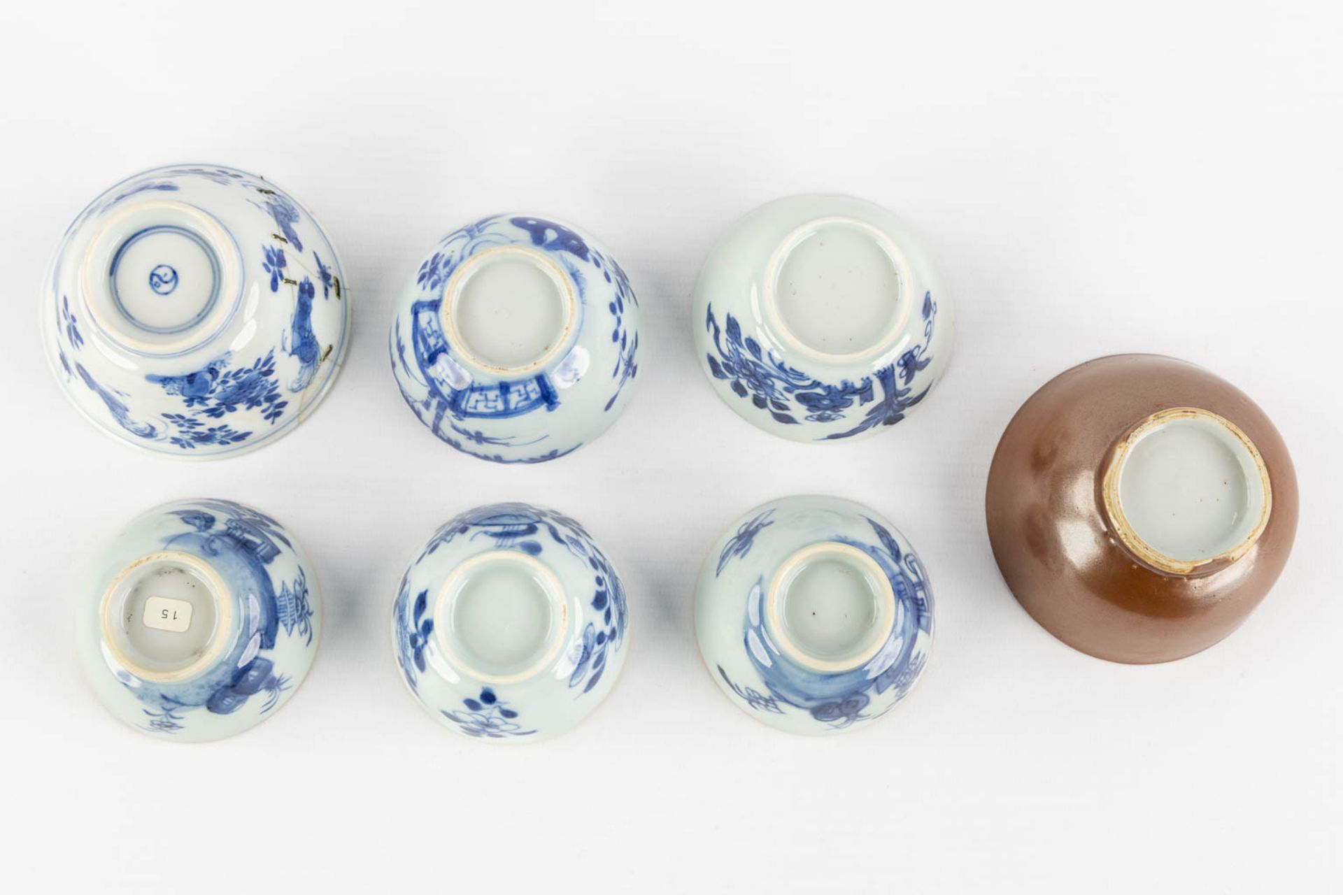 Seven cups and a saucer, Chinese porcelain, Kangxi, Yongzheng and Qianlong period. 18th C. (H:4,5 x - Image 6 of 13