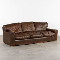 A vintage, three-person leather sofa. Circa 1970. (L:90 x W:225 x H:78 cm)