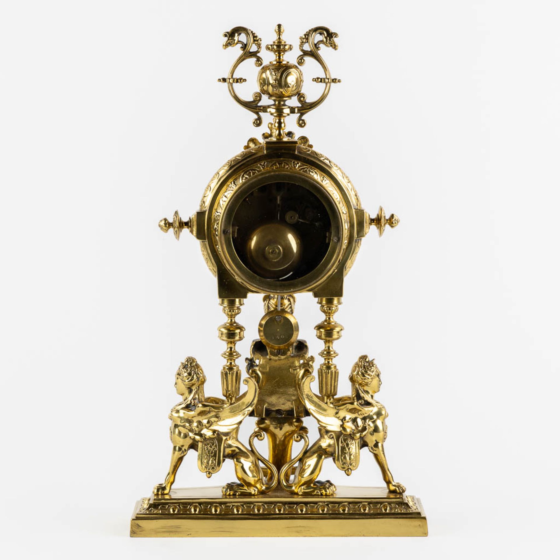 A mantle clock, polished bronze, decorated with Mythological Figures. Circa 1880. (L:15 x W:26 x H:4 - Image 5 of 12