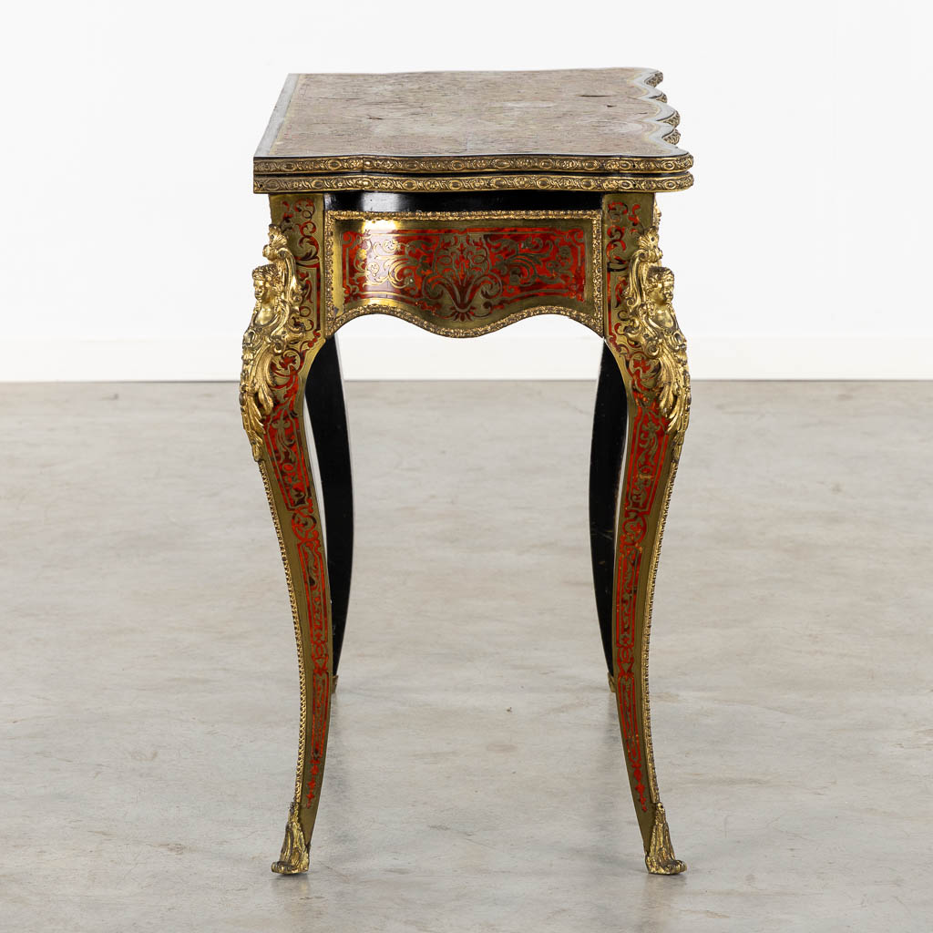 A 'Boulle inlay' card playing table mounted with gilt bronze, Napoleon 3, 19th C. (L:45 x W:87 x H:7 - Image 6 of 16