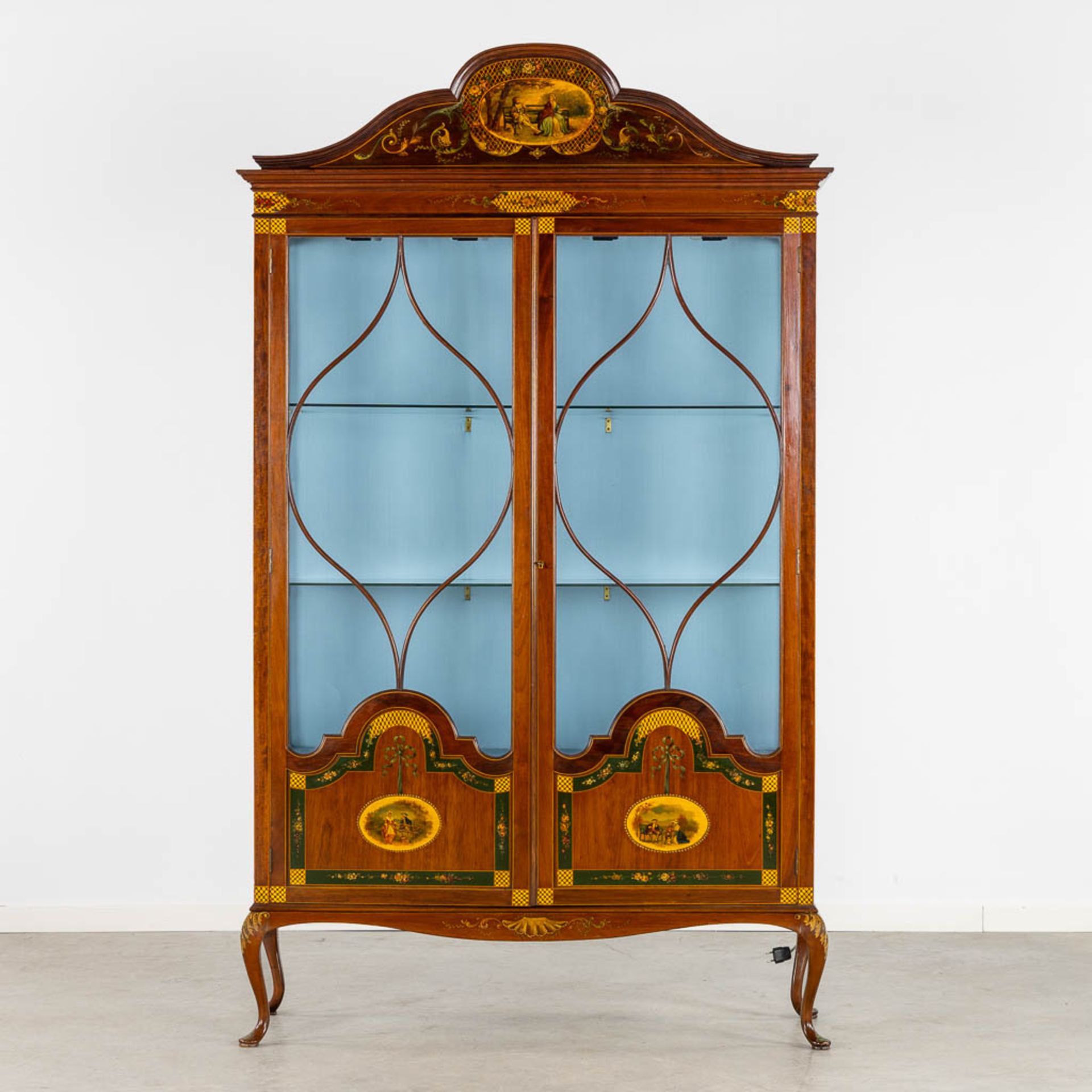 An attractive English display cabinet, hand-painted decors. Circa 1920. (L:39 x W:124 x H:210 cm)