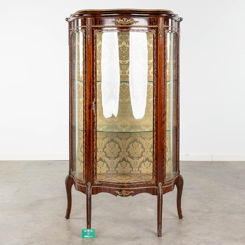 A vintage display cabinet, curved glass mounted with bronze in Louis XV style. (L:35 x W:80 x H:140 - Image 2 of 16