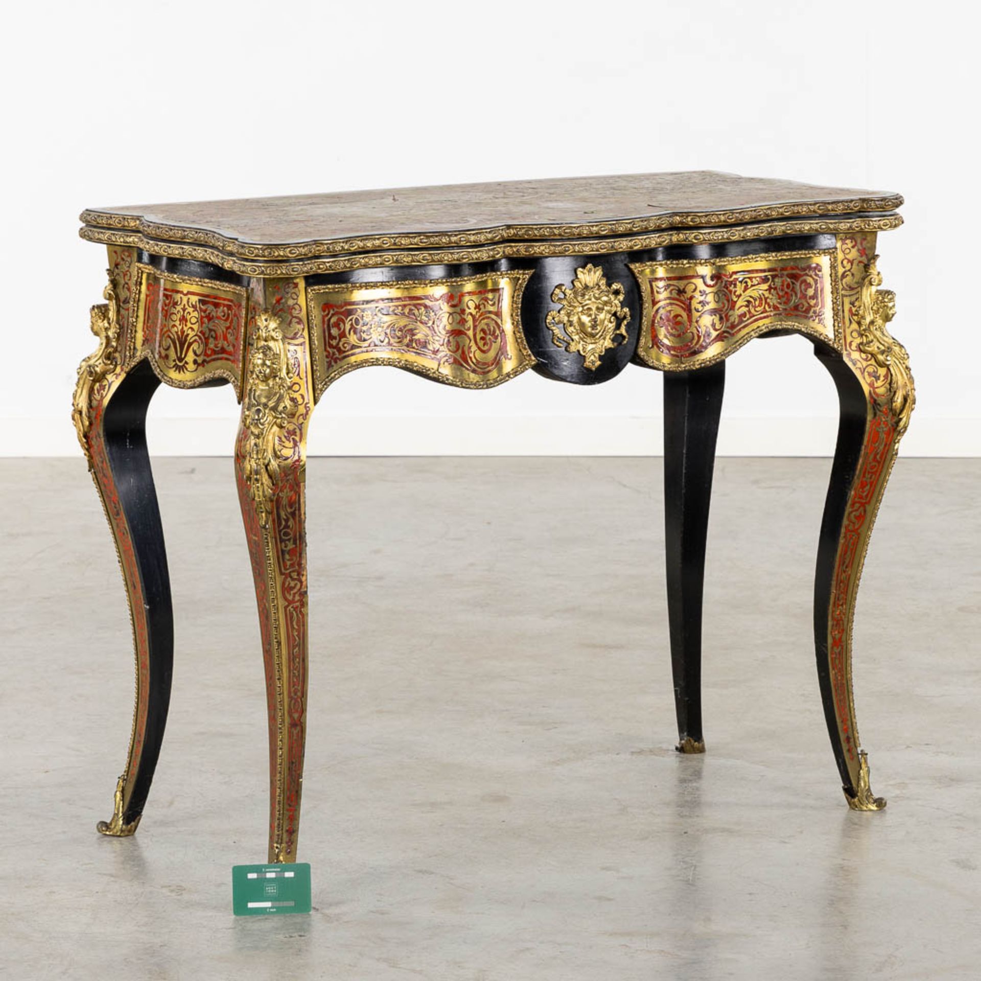 A 'Boulle inlay' card playing table mounted with gilt bronze, Napoleon 3, 19th C. (L:45 x W:87 x H:7 - Bild 2 aus 16
