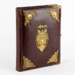 A family picture book, leather mounted with bronze, Art Nouveau. 