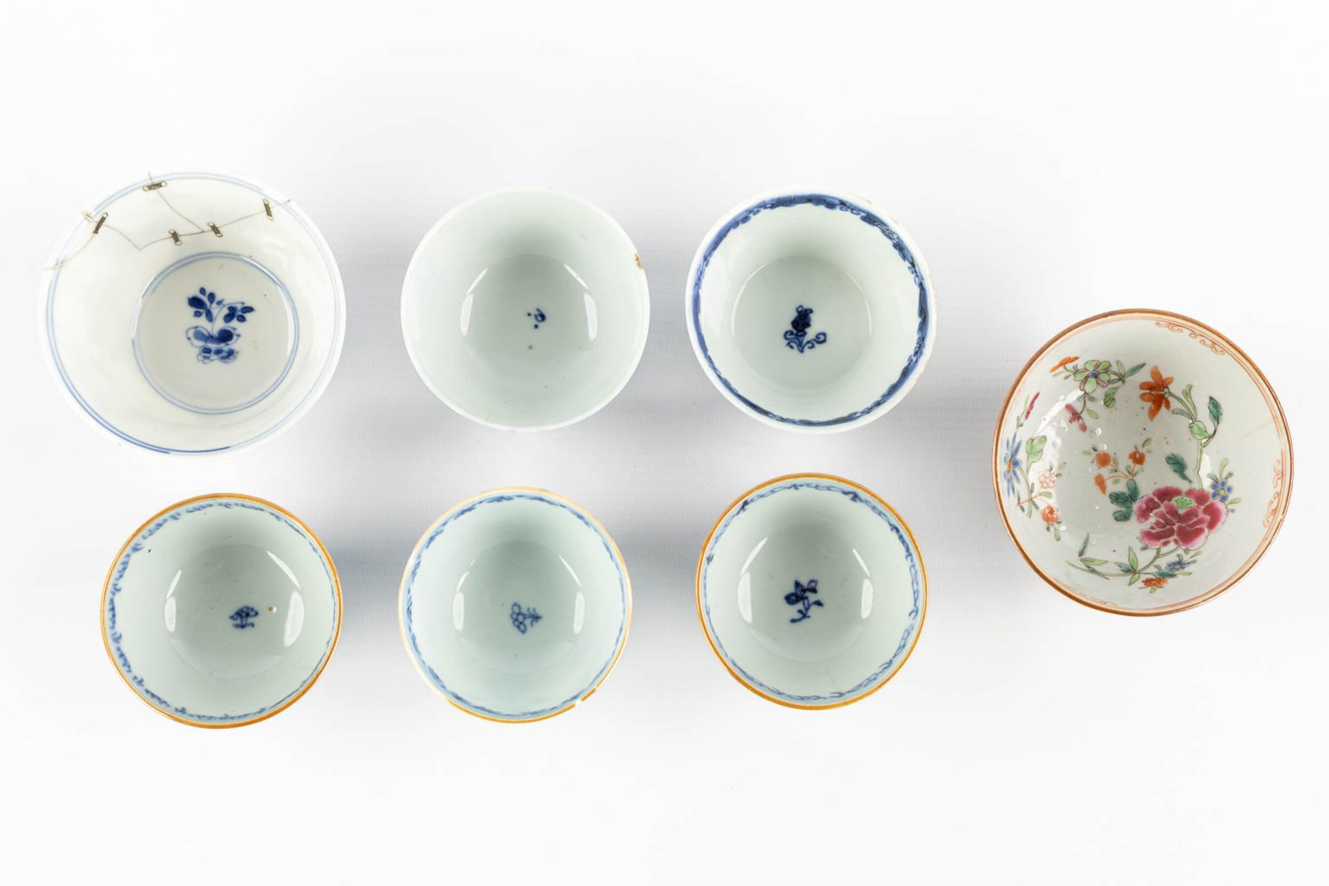 Seven cups and a saucer, Chinese porcelain, Kangxi, Yongzheng and Qianlong period. 18th C. (H:4,5 x - Image 5 of 13