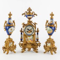 A three-piece mantle garniture clock and side pieces, bronze mounted with porcelain. (L:12 x W:20 x