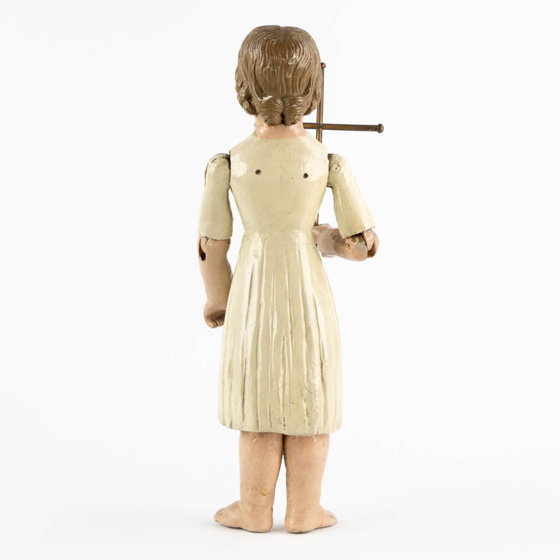 An antique patinated and wood-sculptured doll. 19th C. (L:11,5 x W:17 x H:45 cm) - Image 6 of 12