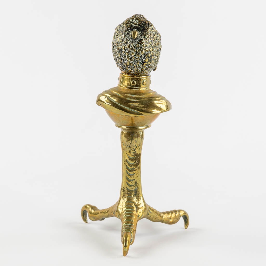 An antique Cigarette or Cigar lighter, polished bronze in the shape of a Blackamoor. 19th/20th C. (L - Image 5 of 11