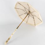 A sunshade with ivory handle, France, 19th C. (L:60 cm)