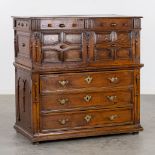 An antique commode, doors and drawers. Sculptured oak, 18th C. (L:55 x W:108 x H:109 cm)