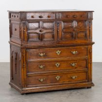 An antique commode, doors and drawers. Sculptured oak, 18th C. (L:55 x W:108 x H:109 cm)