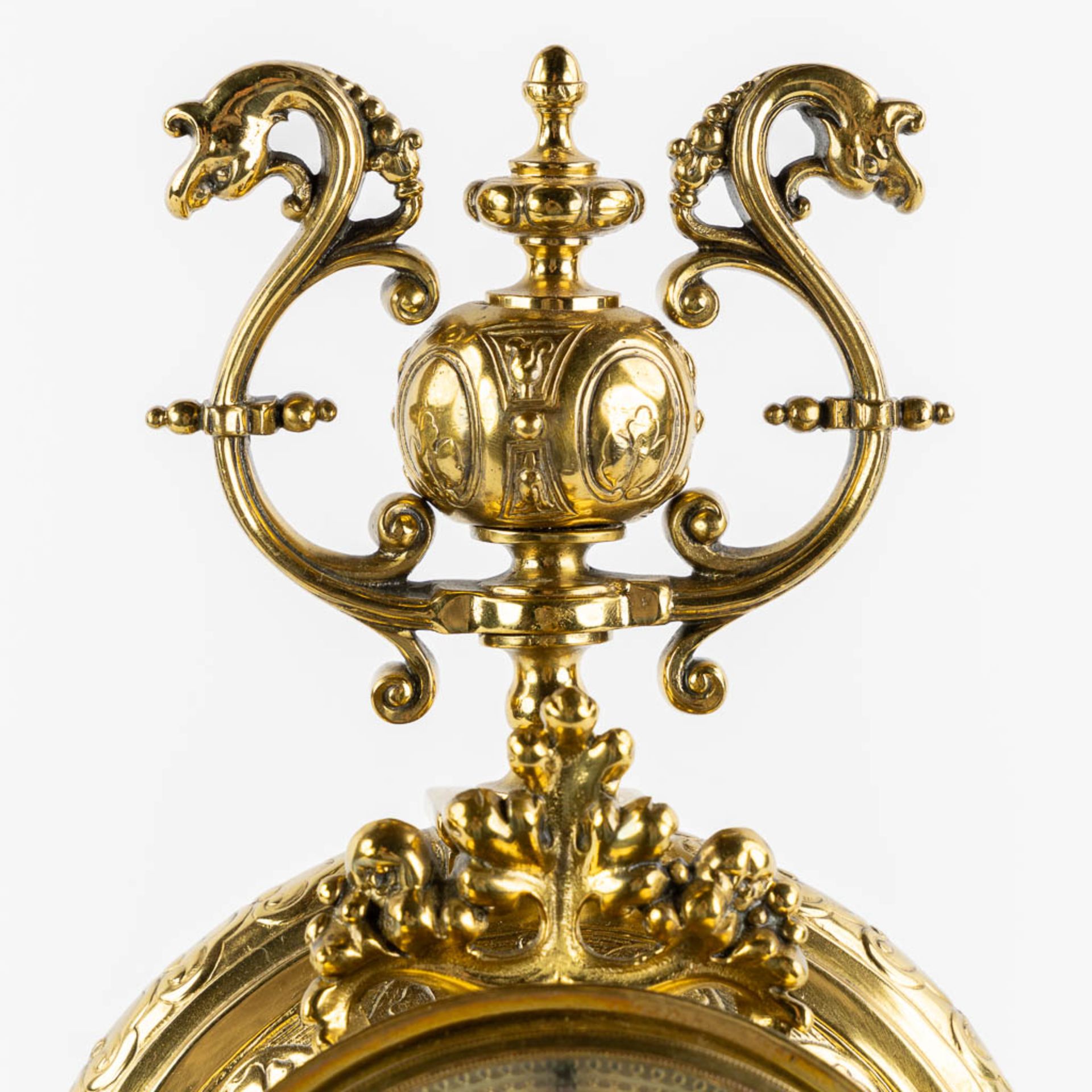 A mantle clock, polished bronze, decorated with Mythological Figures. Circa 1880. (L:15 x W:26 x H:4 - Image 7 of 12