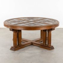 An exceptional Gothic Revival round table, inlaid with stained glass. Circa 1900. (H:78 x D:180 cm)