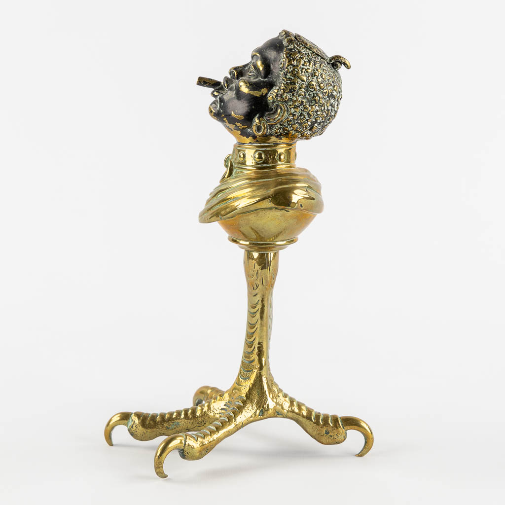An antique Cigarette or Cigar lighter, polished bronze in the shape of a Blackamoor. 19th/20th C. (L - Image 4 of 11