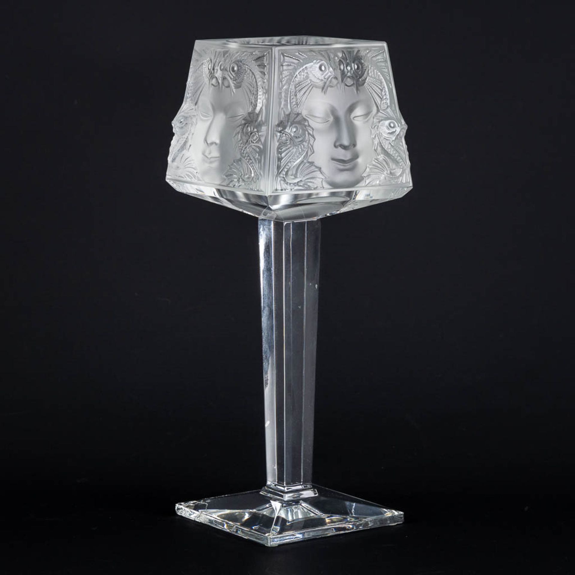 Lalique 'Masque De Femme' a candle holder on a high base. (L:11,5 x W:11,5 x H:30,5 cm)