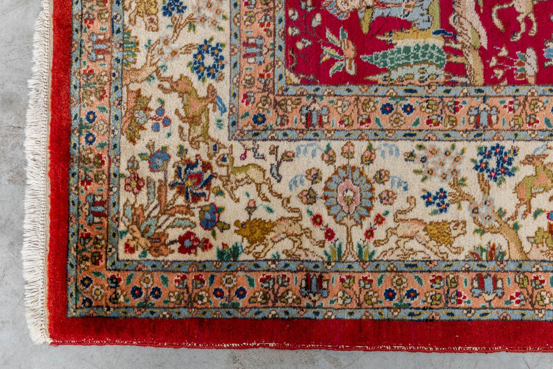 A large Oriental hand made carpet, hunting scènes, Tabriz. (L:329 x W:252 cm) - Image 12 of 16