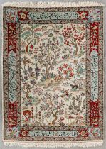 An Oriental hand-made carpet, Tabriz. Signed. (L:150 x W:107 cm)