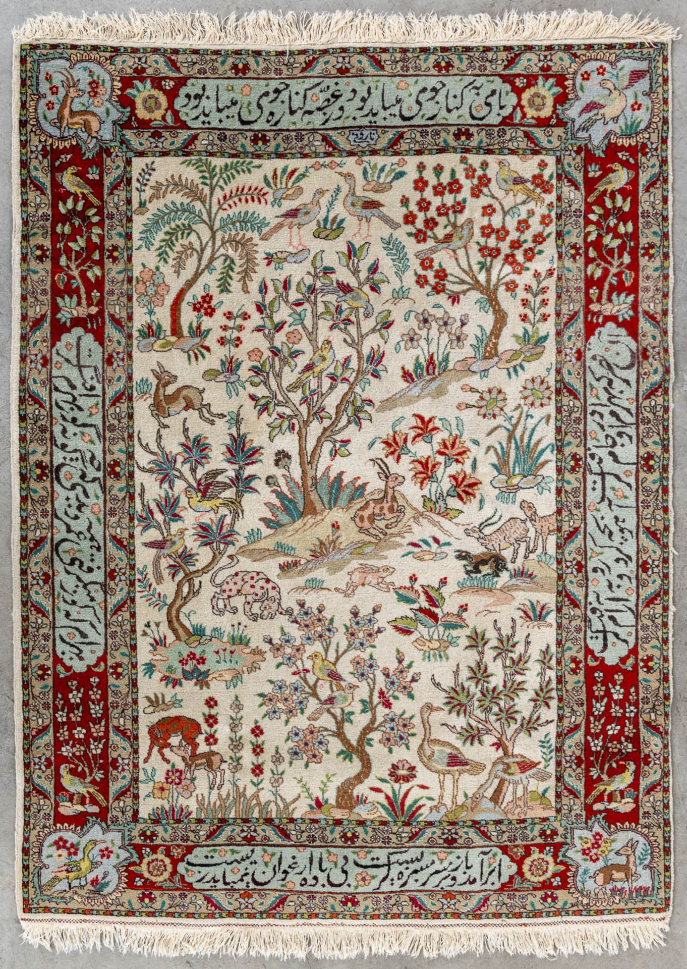 An Oriental hand-made carpet, Tabriz. Signed. (L:150 x W:107 cm)