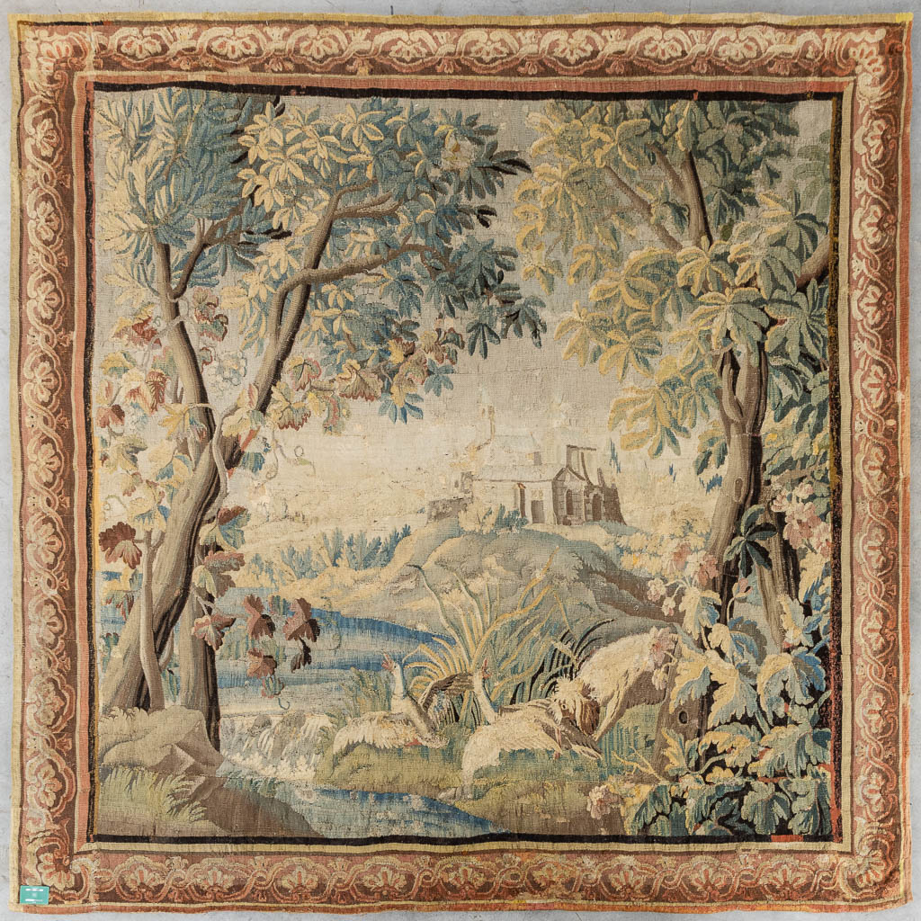 An antique 'Verdure' tapissery, Decorated with a castle, fauna and flora. 17th C. (W:276 x H:277 cm) - Image 2 of 10