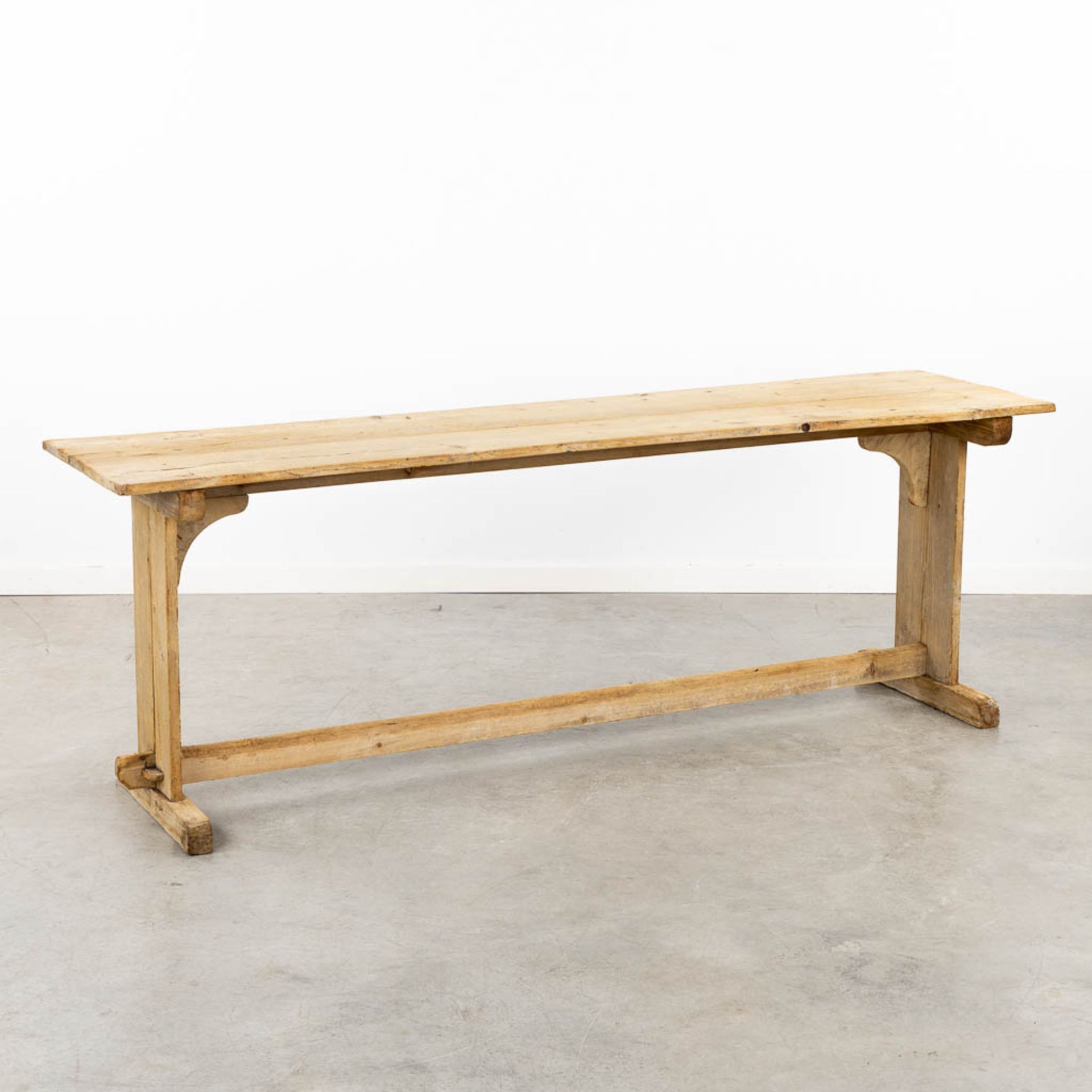 A small monastery table, pine wood. (L:50 x W:190 x H:68 cm)