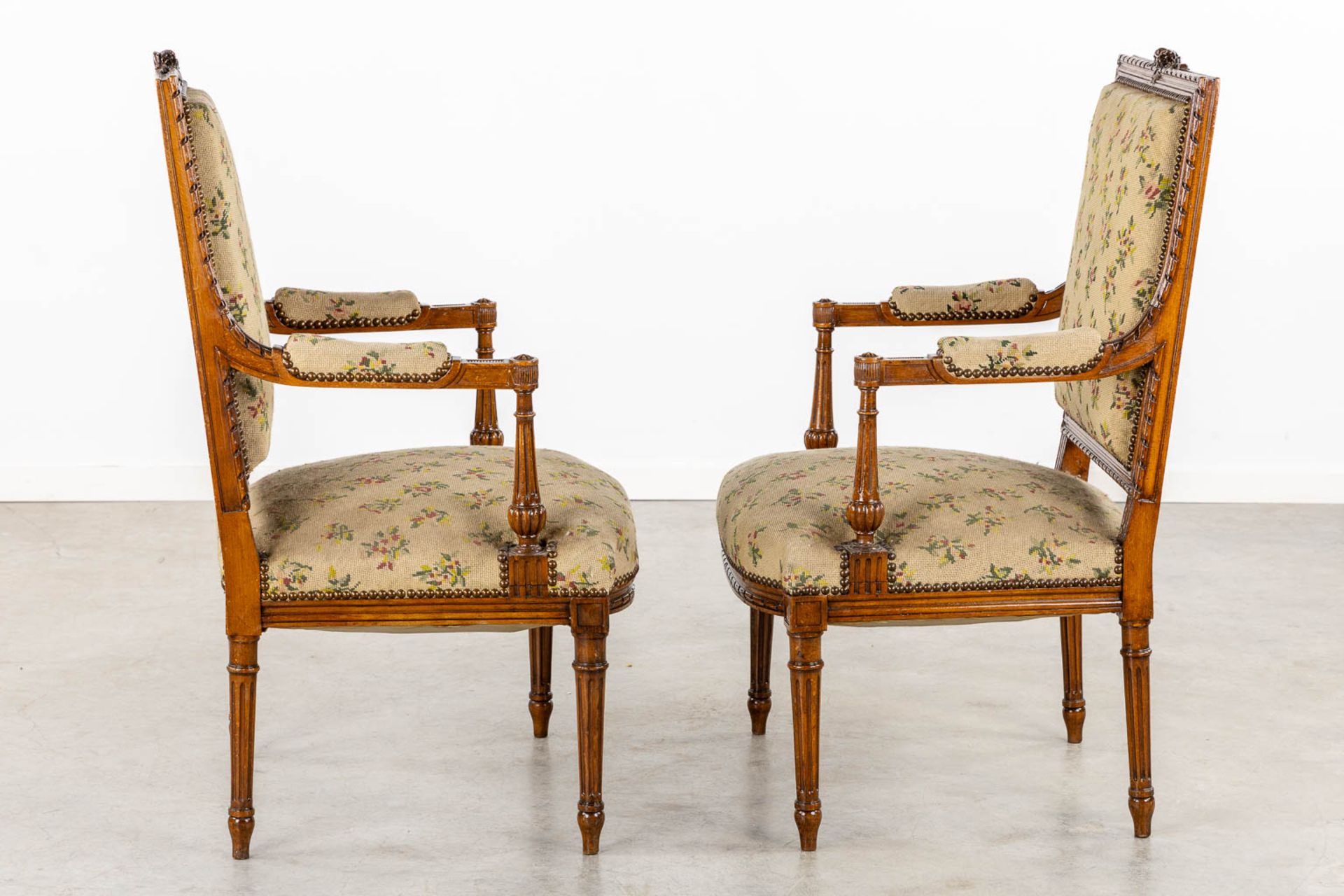 A pair of wood-sculptured armchairs with emboidered upholstry. Louis XVI style. (L:62 x W:64 x H:100 - Image 6 of 11