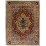 An Oriental hand-made carpet, Ghoum. (L:264 x W:353 cm)