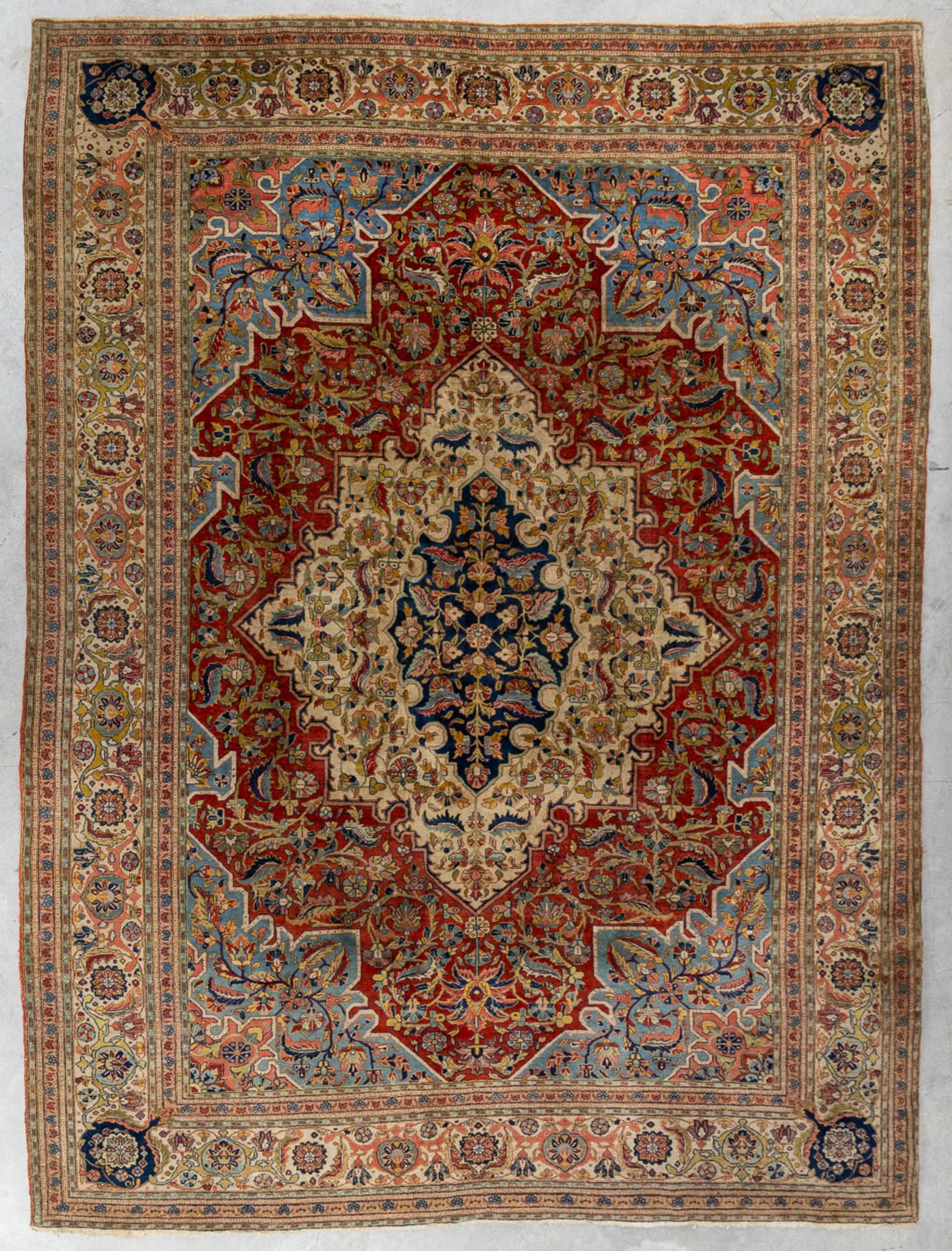 An Oriental hand-made carpet, Ghoum. (L:264 x W:353 cm)