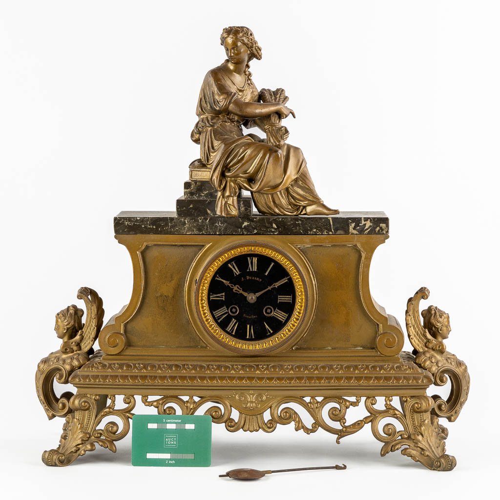 J. Dusart Bruxelles, A mantle clock. Gilt spelter and marble. Circa 1900. (L:20 x W:47 x H:46 cm) - Image 2 of 10