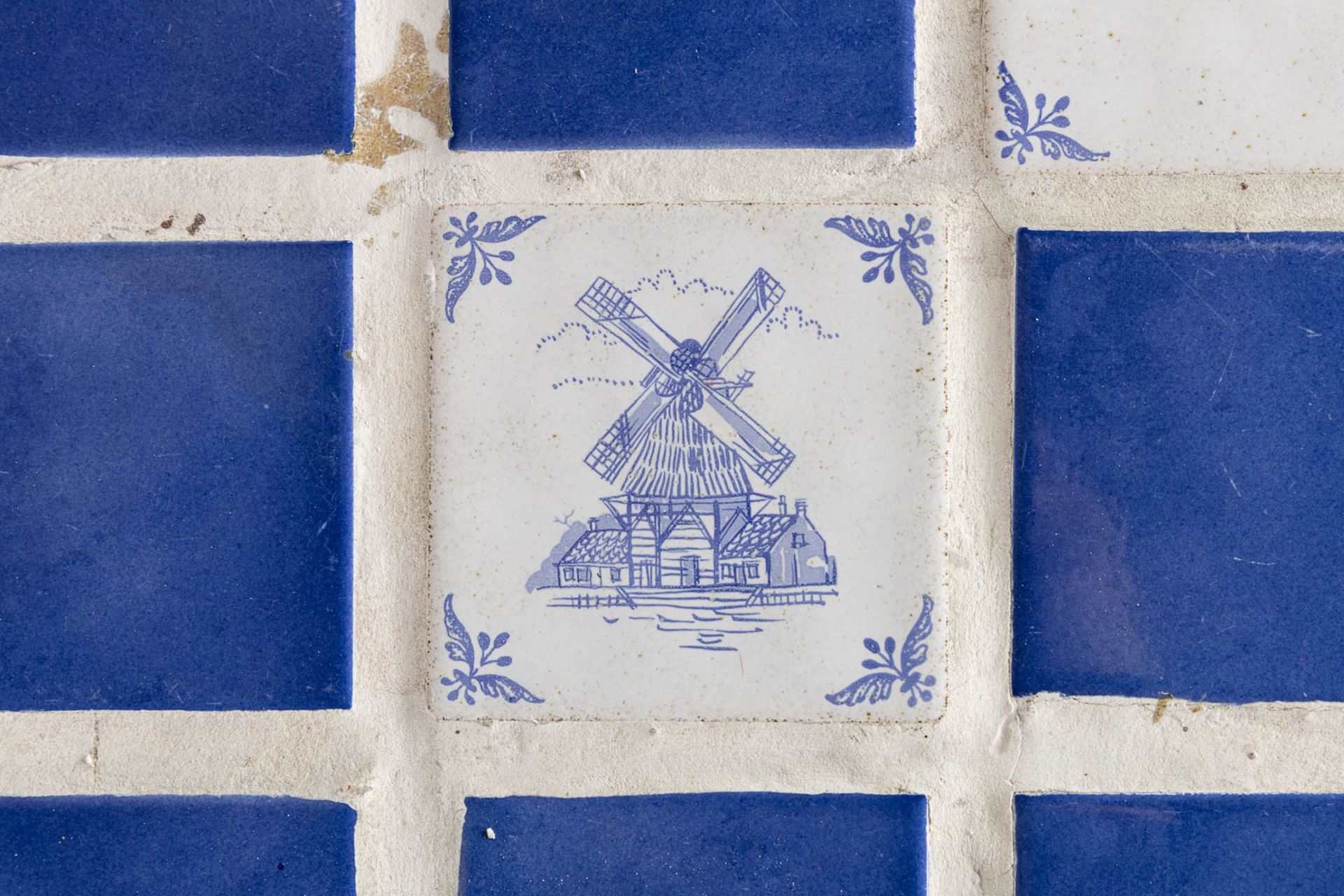 A Spanish table, finished with white and blue tiles. (L:85 x W:184 x H:76 cm) - Image 11 of 11