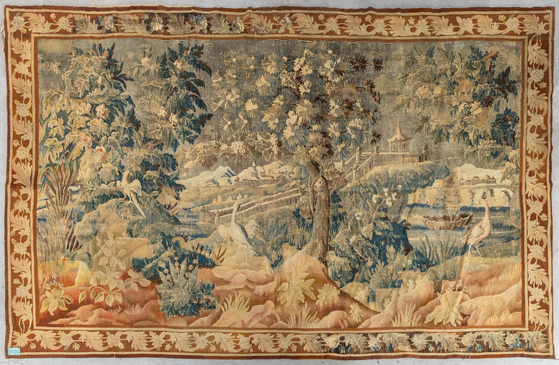 An antique Tapissery, decorated with fauna and flora. 17th C. (L:400 x W:260 cm)