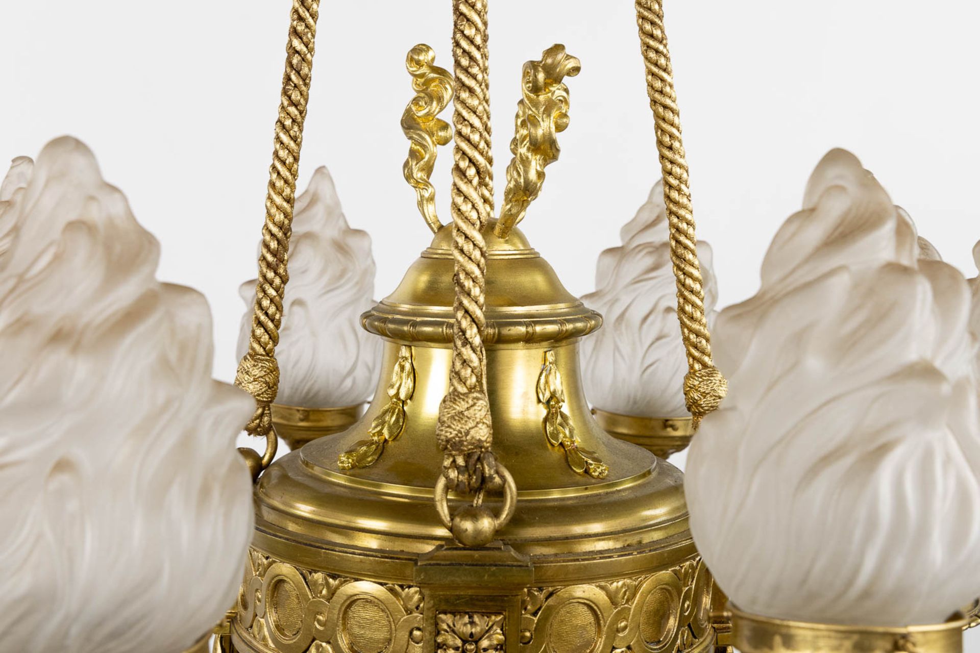 A chandelier, bronze in a Louis XVI style. Gilt bronze. (H:100 x D:72 cm) - Image 4 of 9