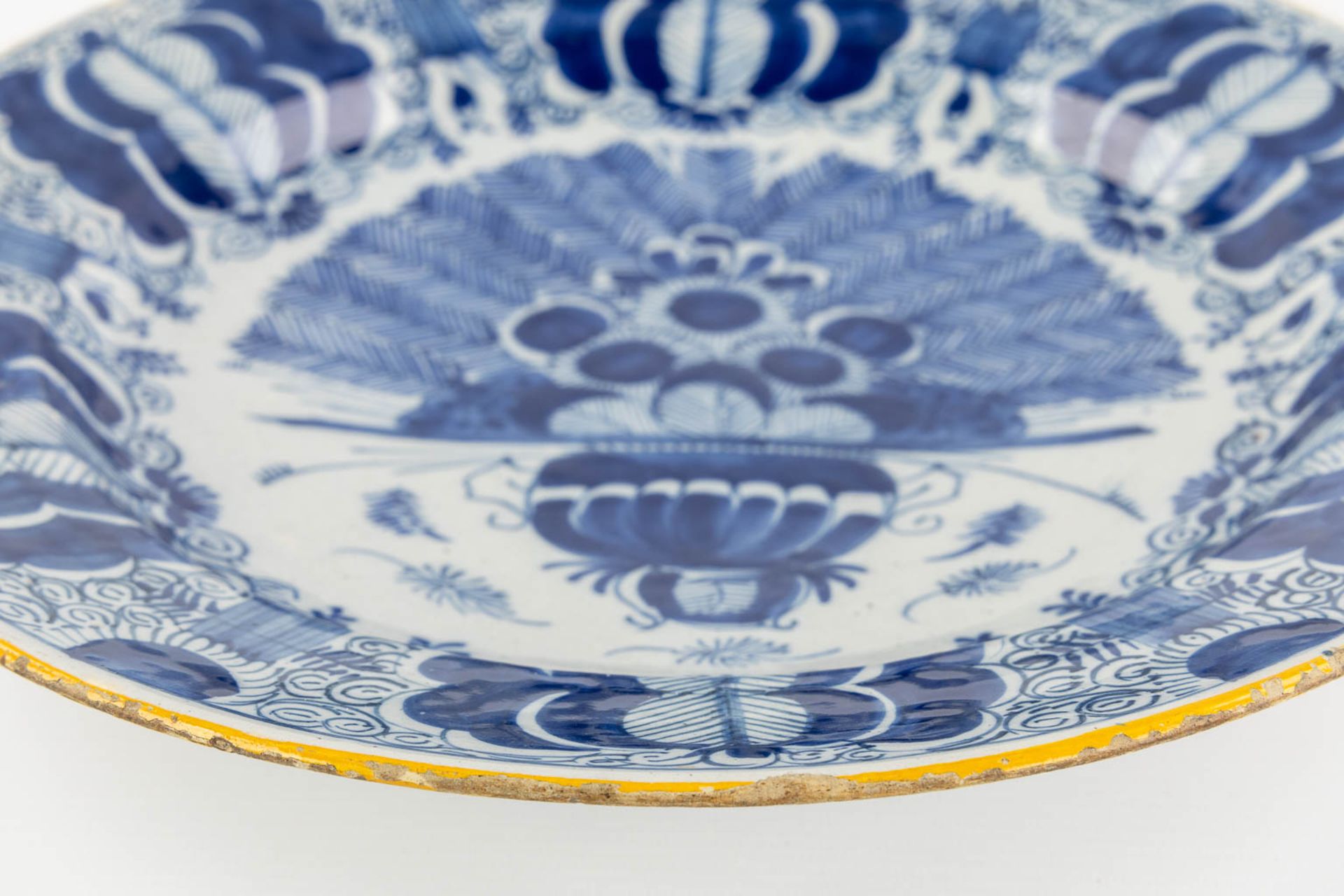 Delft, 'De Drie Klokken' A 5-piece 'Kaststel', added a 'De Porceleyne Klaauw' Peacock plate. 18th. ( - Image 21 of 26