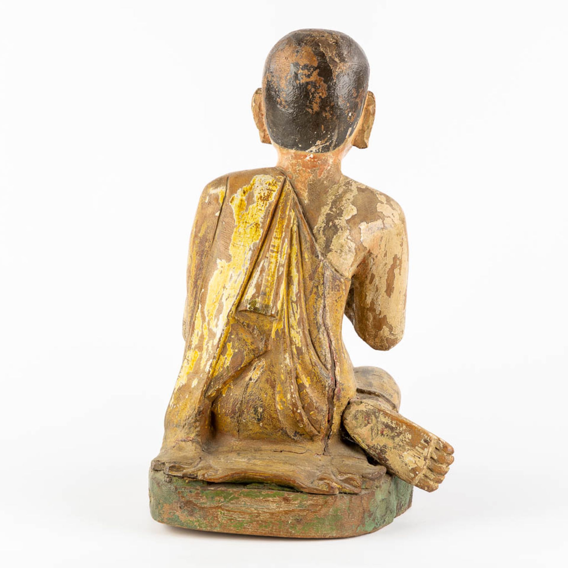 An antique wood-sculptured figurine of a monk. 18th/19th C. (L:36 x W:30 x H:47 cm) - Image 5 of 10