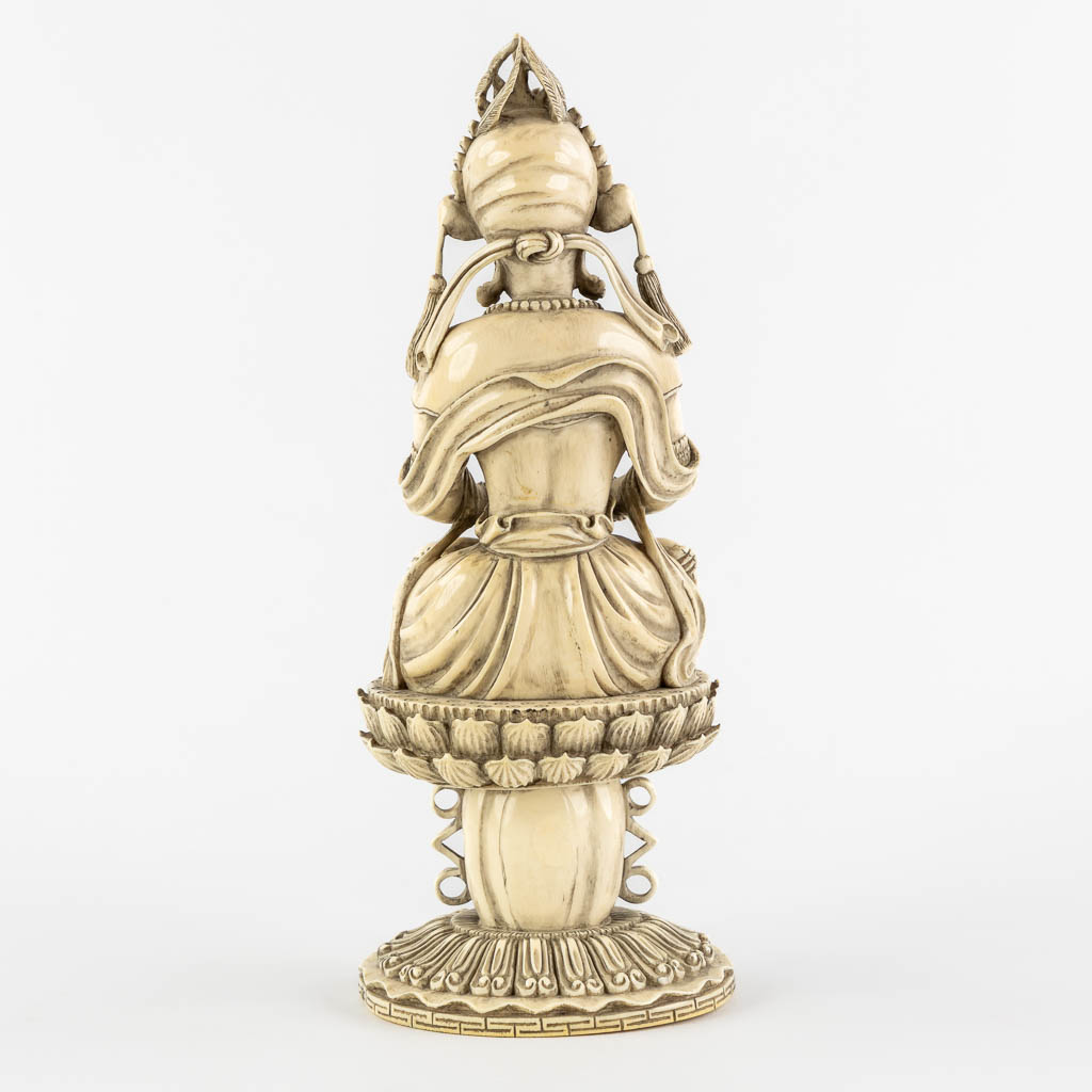 A Chinese Buddha holding a Pagoda, sculptured ivory. Circa 1900. (L:10 x W:12 x H:31 cm) - Image 5 of 11
