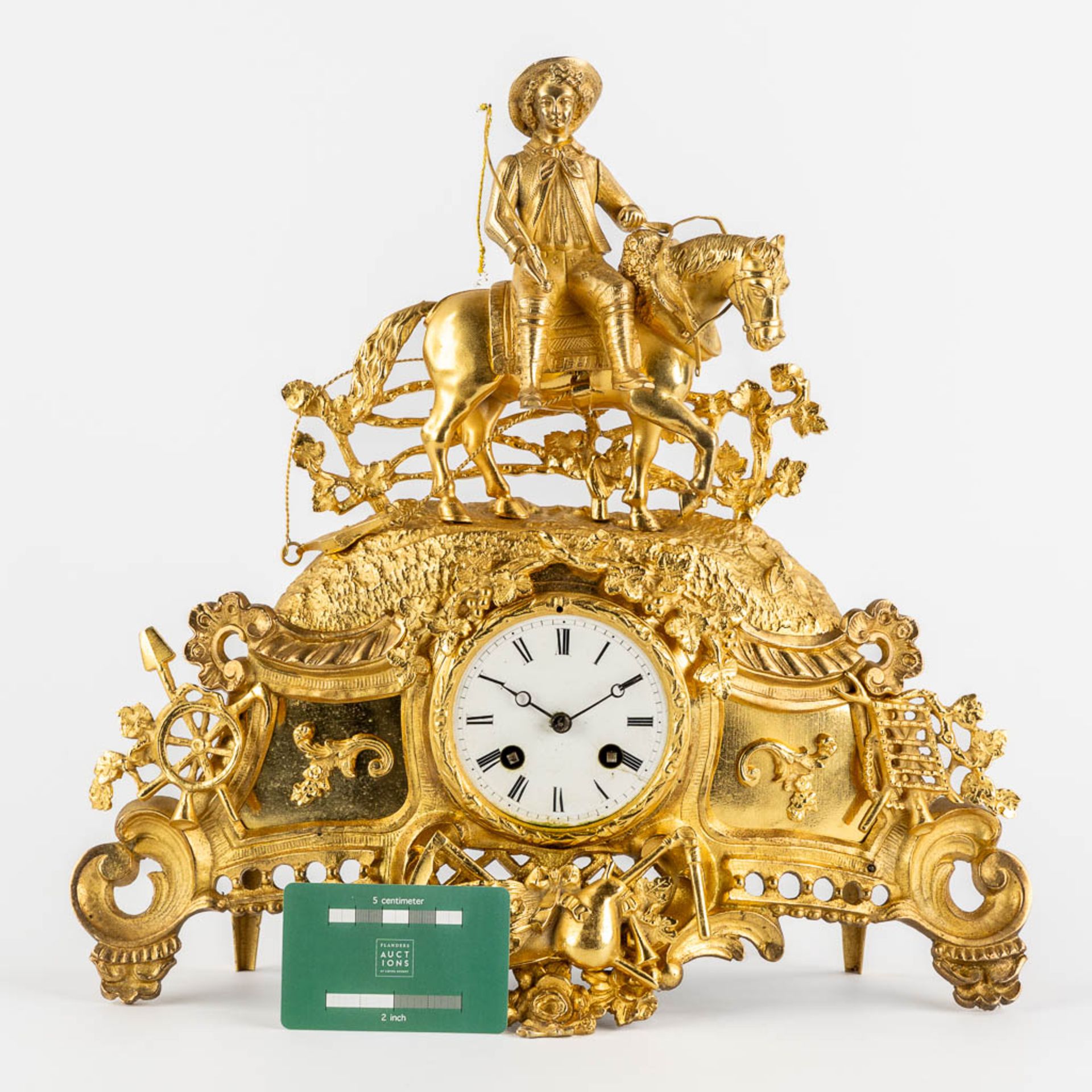 A mantle clock with a 'Horse Rider', gilt bronze. France, 19th C. (L:11,5 x W:38 x H:37 cm) - Image 2 of 12