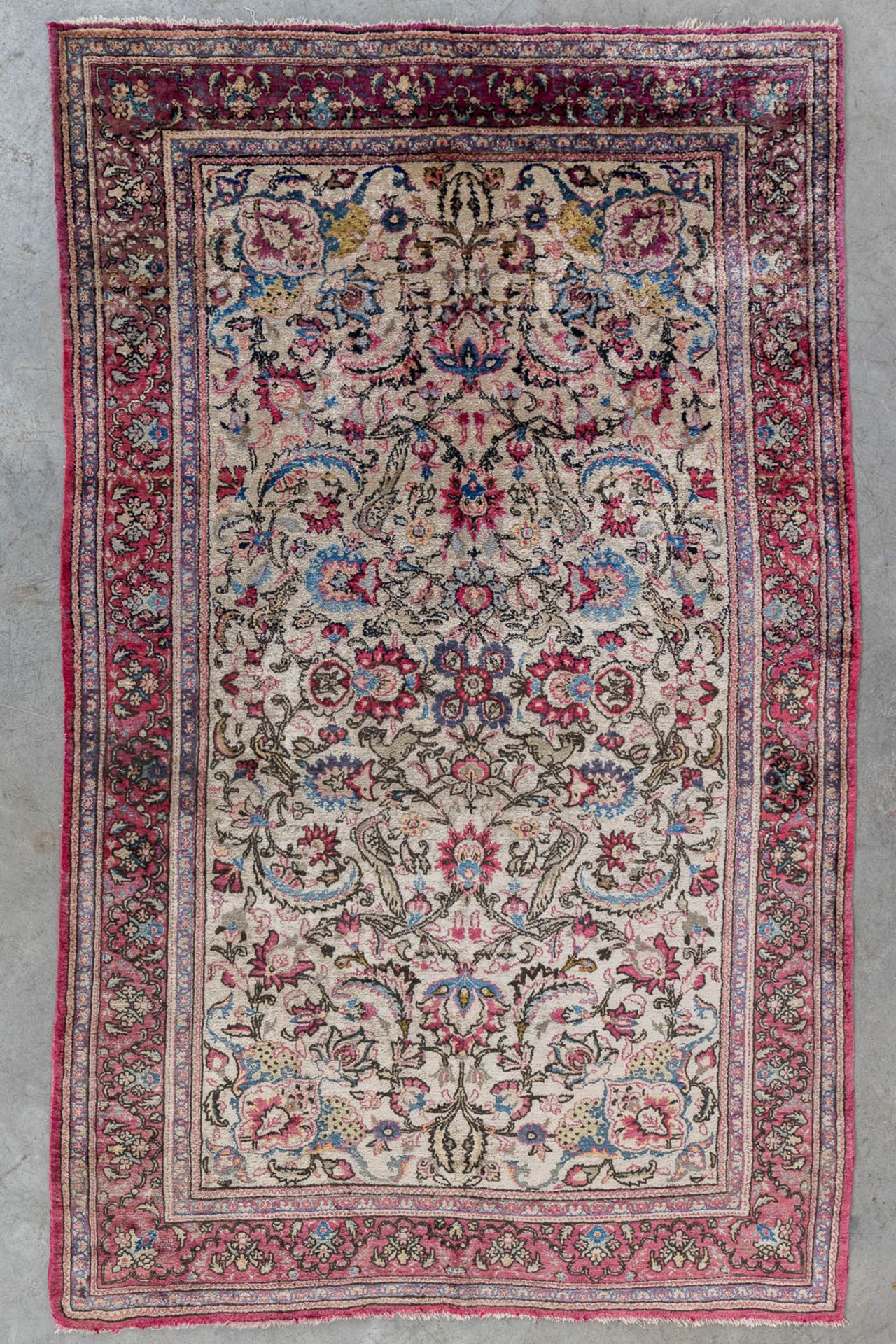 An Oriental hand-made carpet, Kashan, silk. (L:210 x W:135 cm)