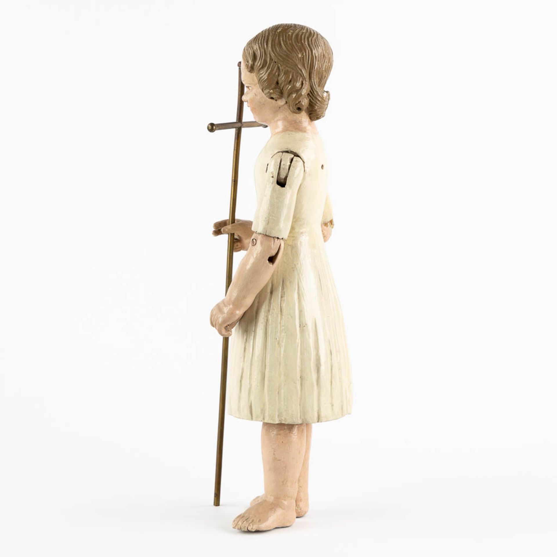An antique patinated and wood-sculptured doll. 19th C. (L:11,5 x W:17 x H:45 cm) - Image 5 of 12