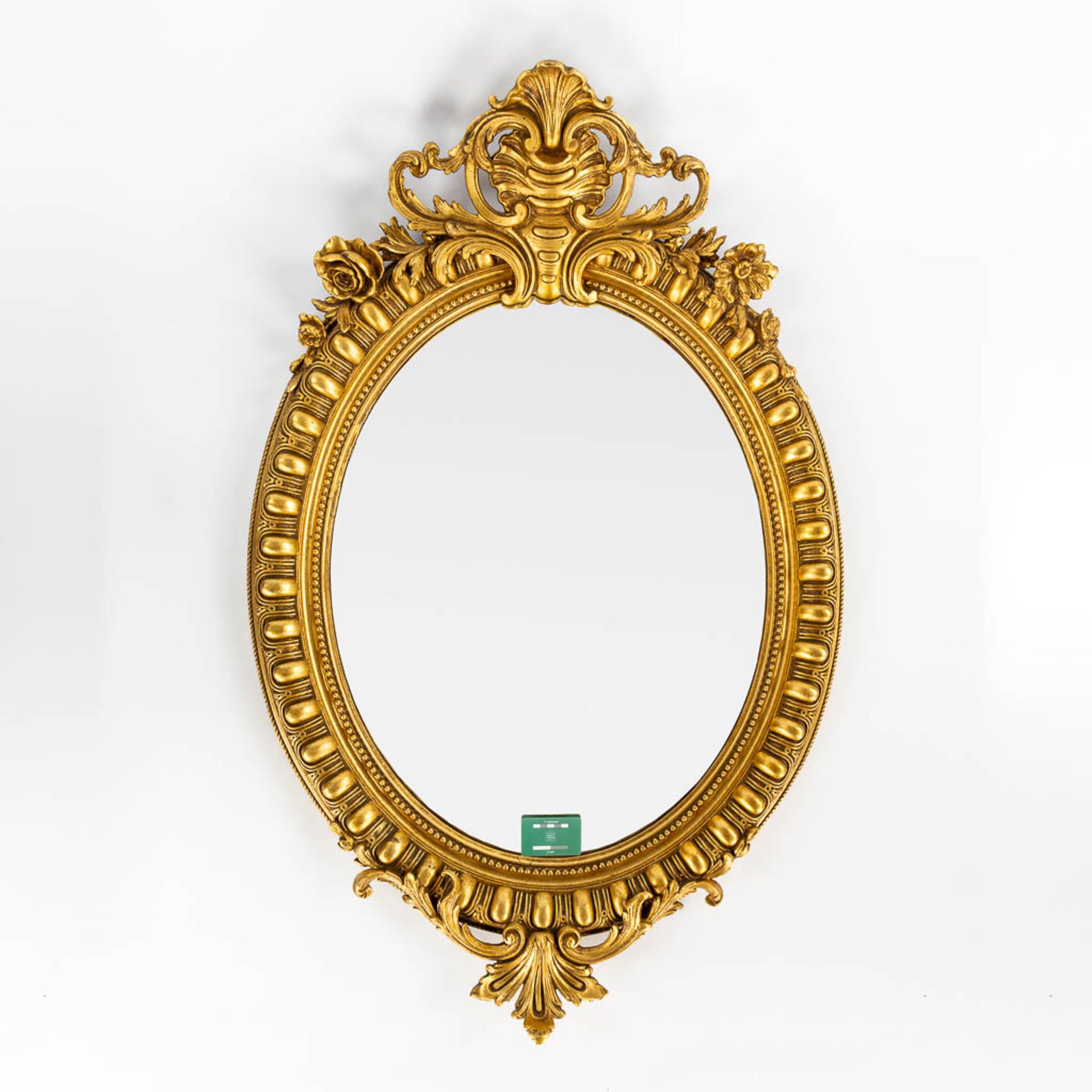 An antique mirror, gilt in a Louis XV style. 19th C. (W:89 x H:126 cm) - Image 2 of 8