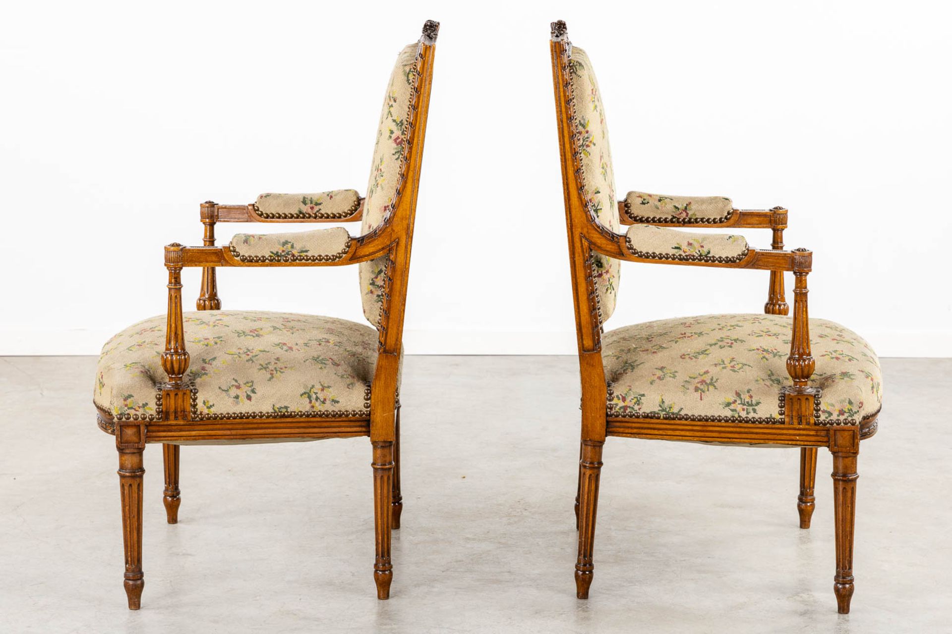 A pair of wood-sculptured armchairs with emboidered upholstry. Louis XVI style. (L:62 x W:64 x H:100 - Image 4 of 11