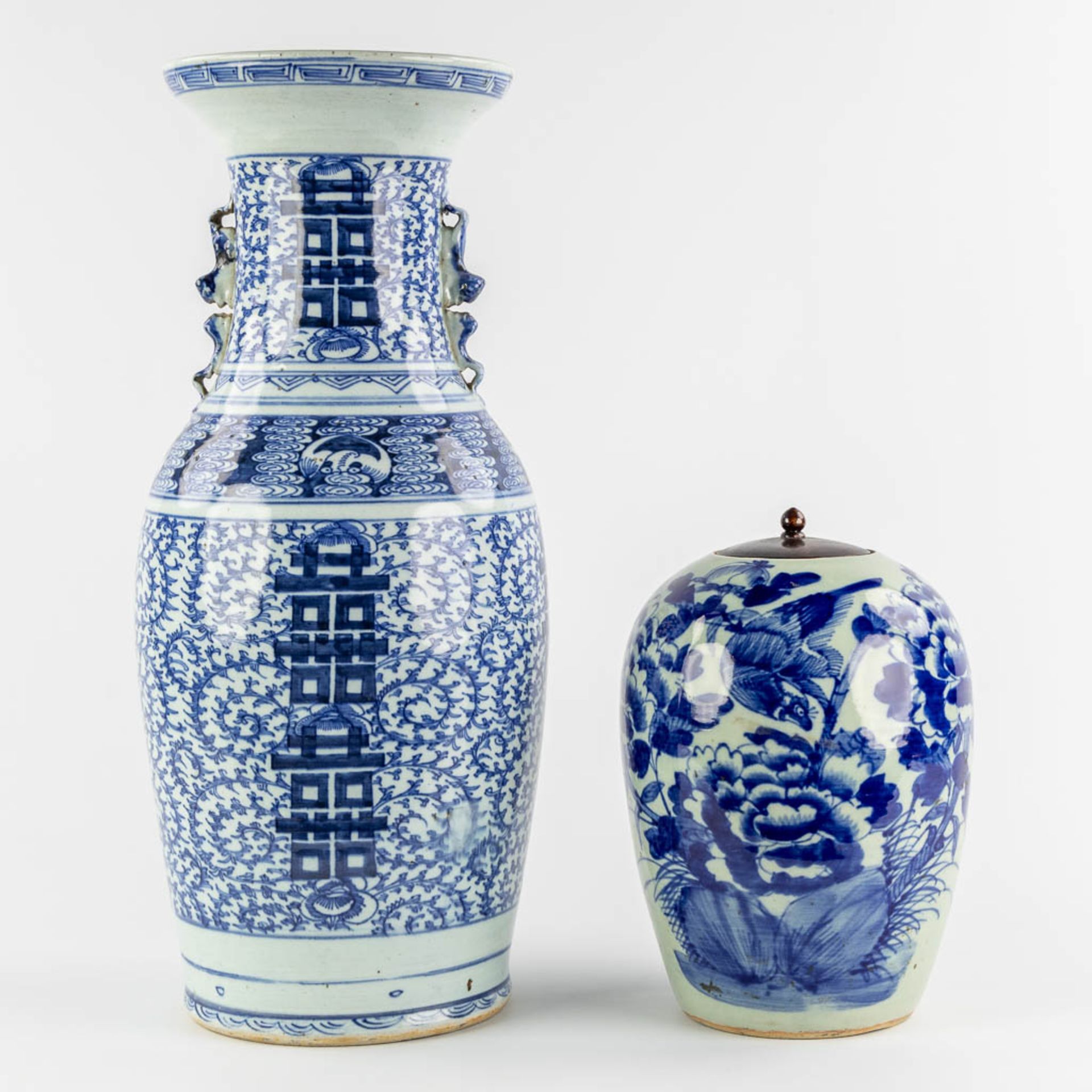 A Chinese celadon vase and ginger jar with a blue-white Double Xi and Floral decor. 19th/20th C. (H: - Image 3 of 11
