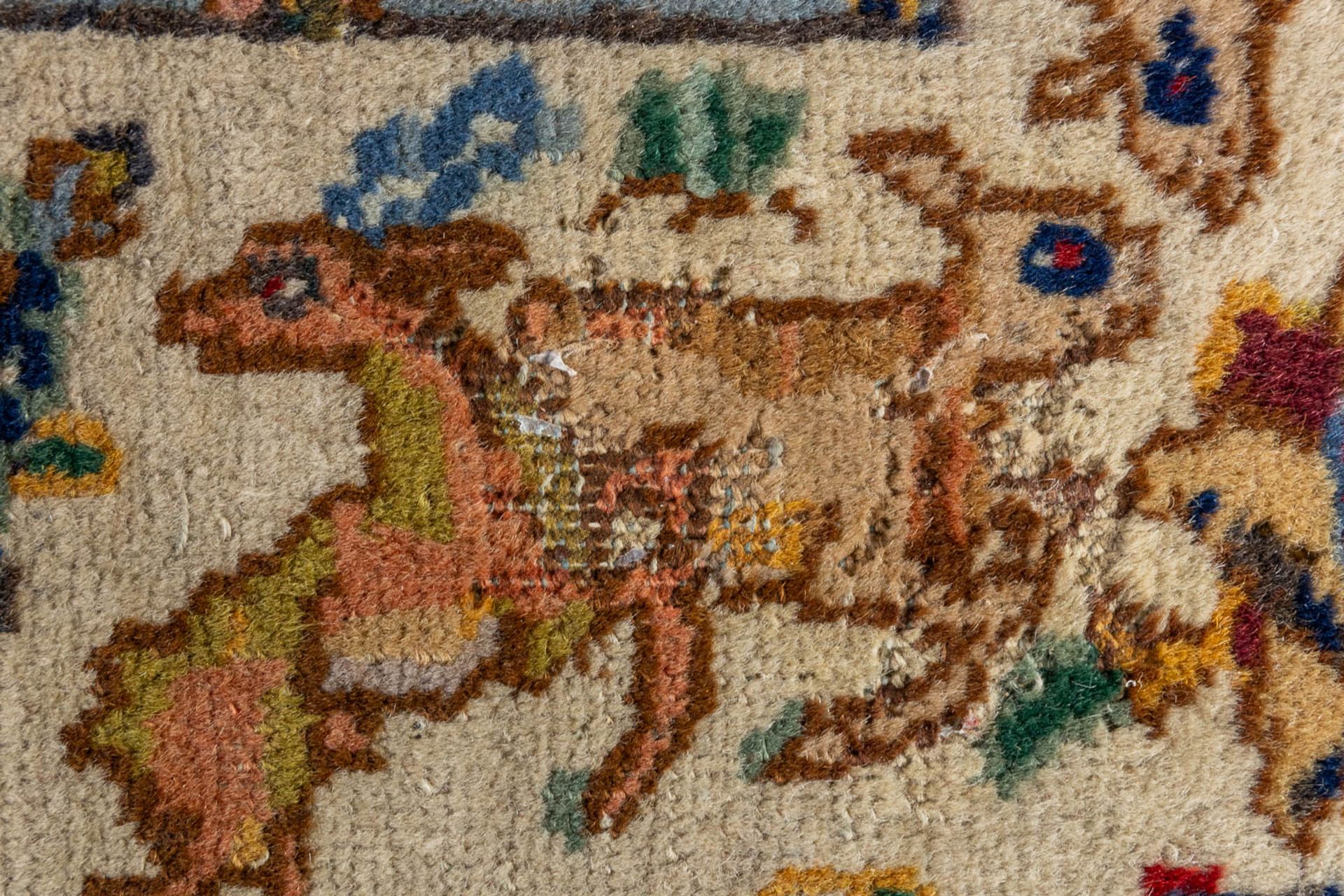 A large Oriental hand made carpet, hunting scènes, Tabriz. (L:329 x W:252 cm) - Bild 4 aus 16