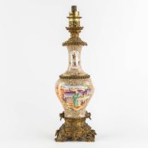 An antique oil lamp, Chinese Famille Rose porcelain mounted with gilt bronze. 19th C. (L:20 x W:20 x