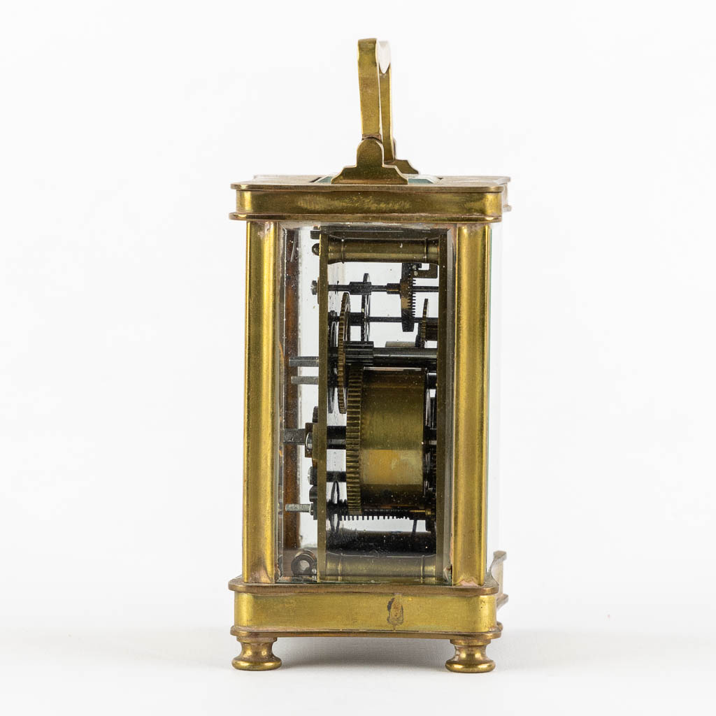 An officer's clock, brass and glass in the original travel case. (L:6,5 x W:8 x H:15 cm) - Image 9 of 12