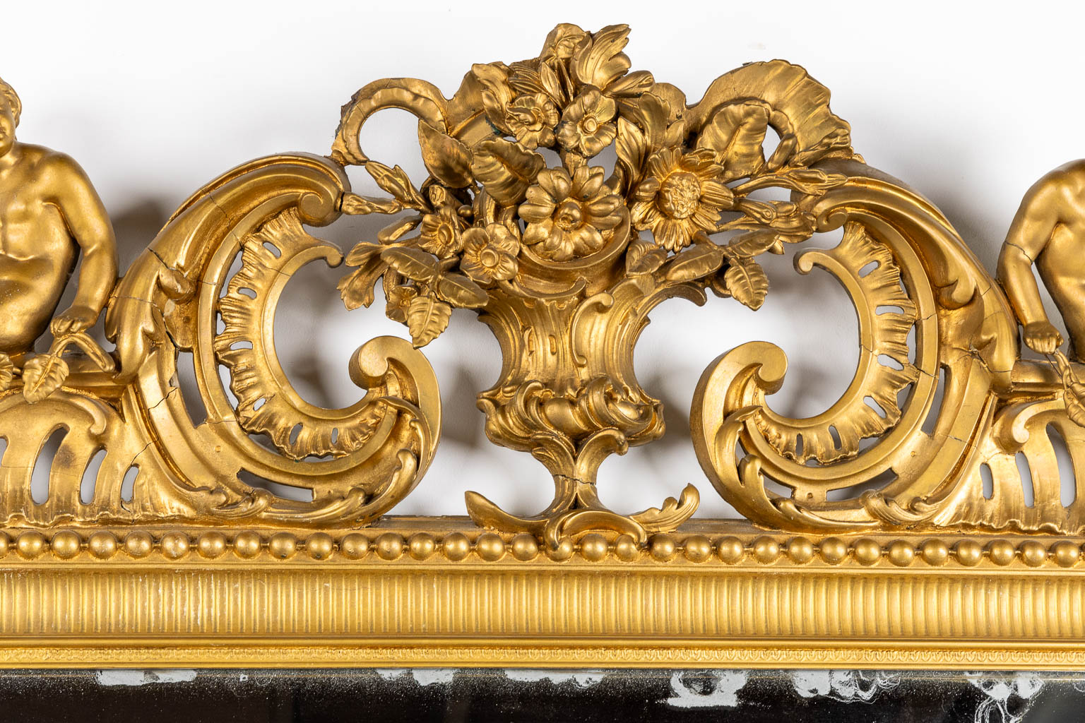 An antique and large mirror, decorated with putti in Louis XV style. Circa 1900. (W:130 x H:225 cm) - Image 4 of 11