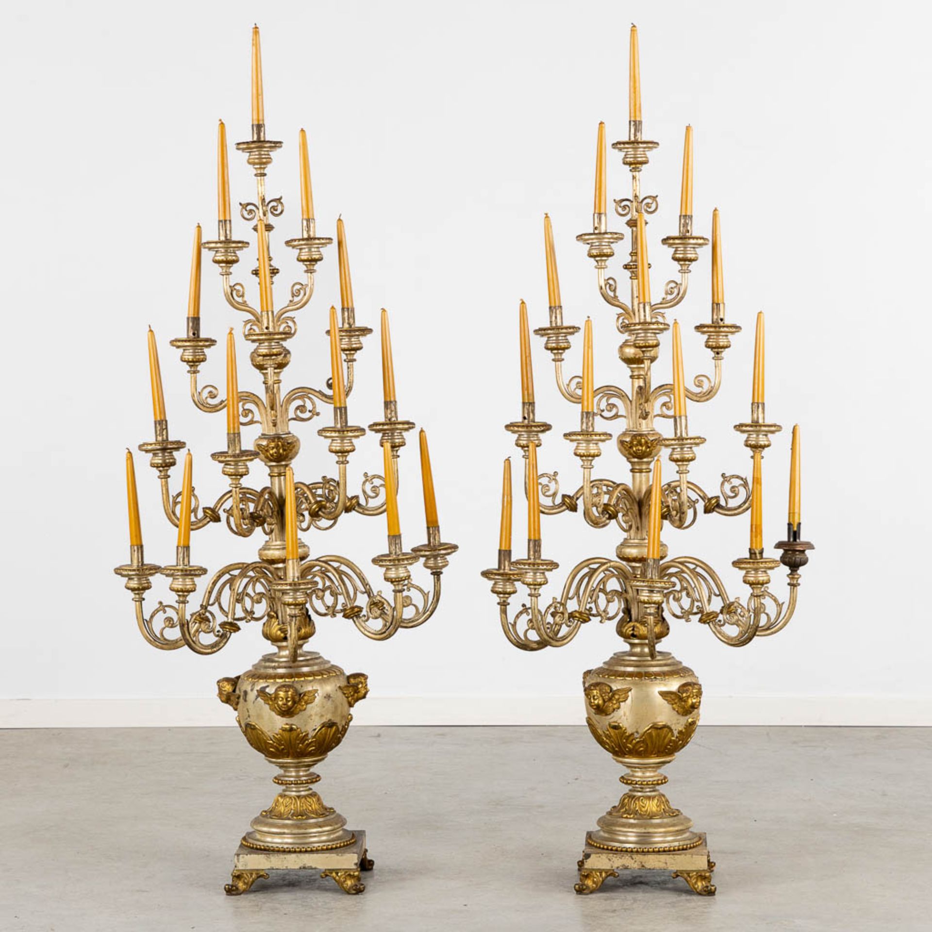 An impressive pair of candelabra, 15 candles, gold and silver-plated metal. (L:44 x W:60 x H:138 cm)