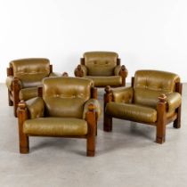 Four identical leather and wood lounge chairs, Circa 1960. (L:94 x W:96 x H:78 cm)
