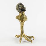 An antique Cigarette or Cigar lighter, polished bronze in the shape of a Blackamoor. 19th/20th C. (L