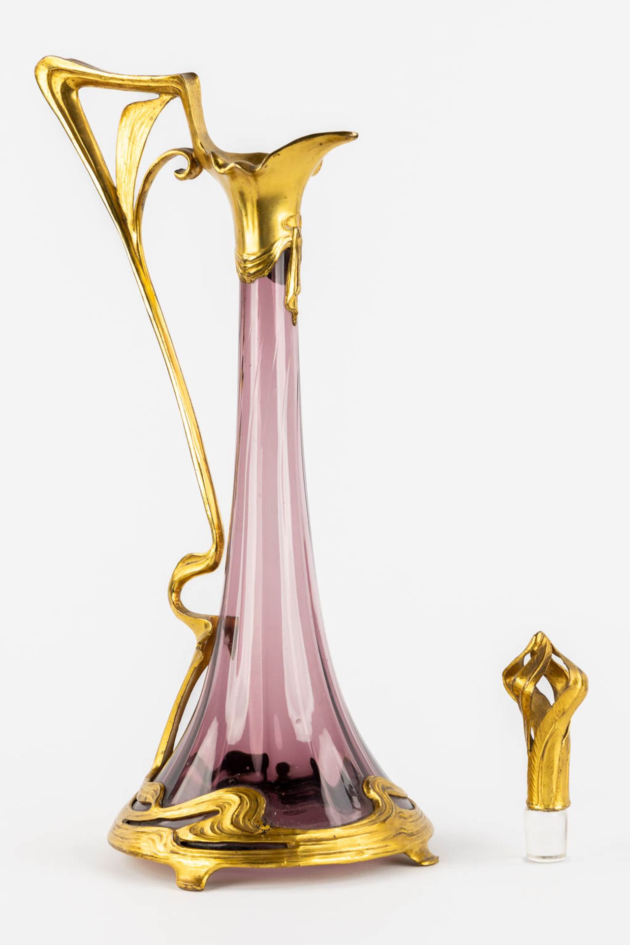 A pitcher, gilt metal and purple glass, Art Nouveau. (L:16 x W:20 x H:39 cm) - Image 7 of 11